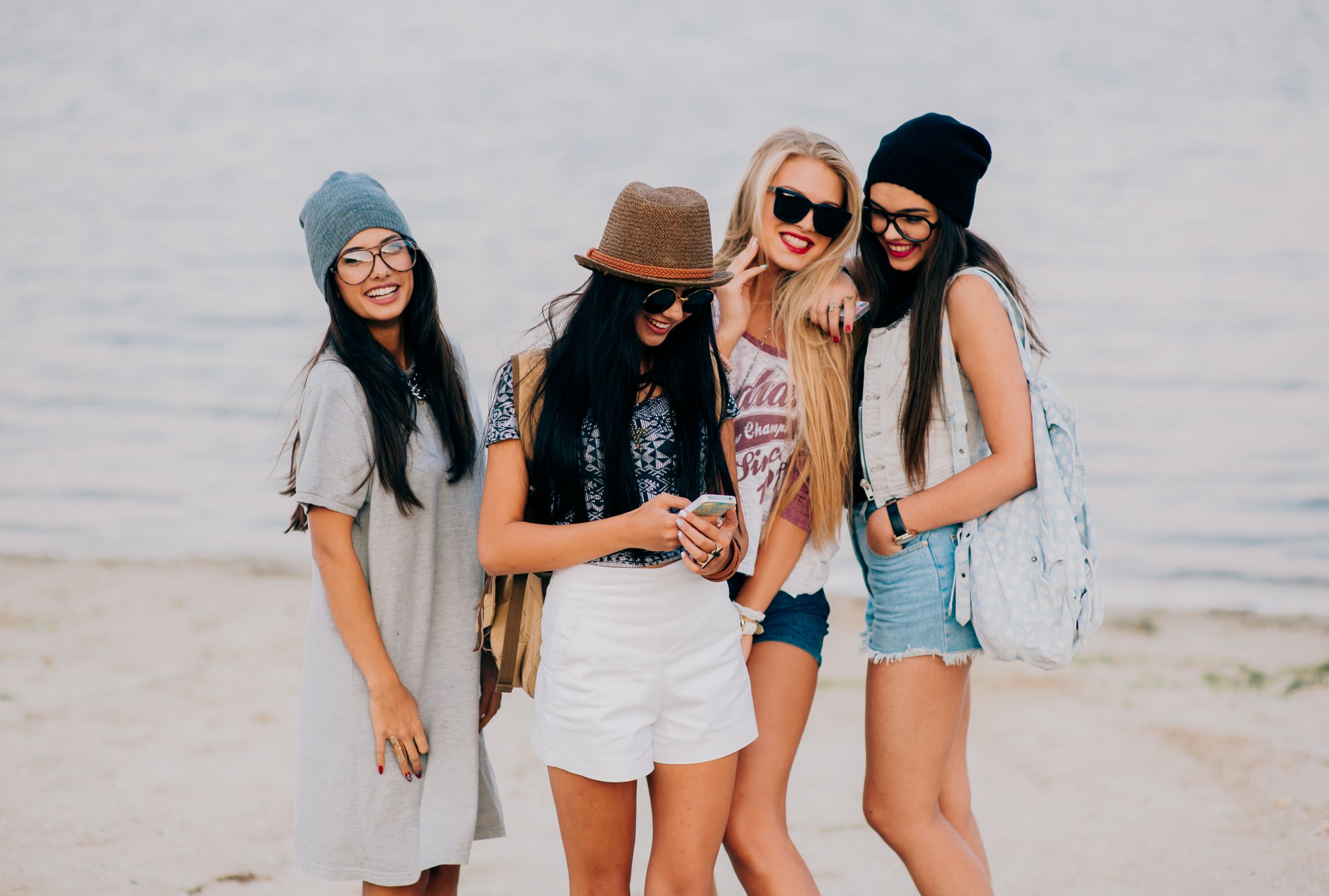 four beautiful girls on the beach