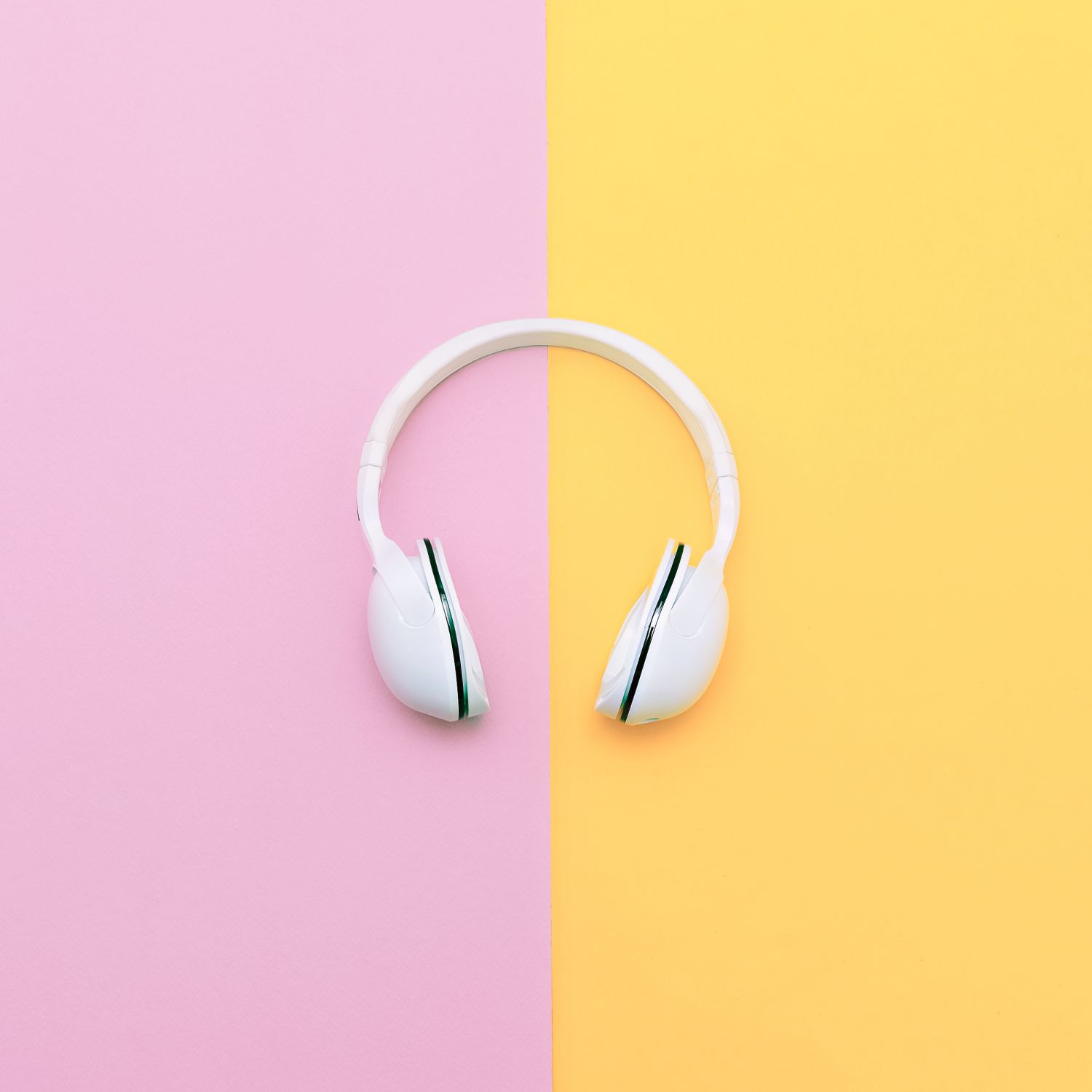 Fashion white headphones on vanilla background. Urban summer time