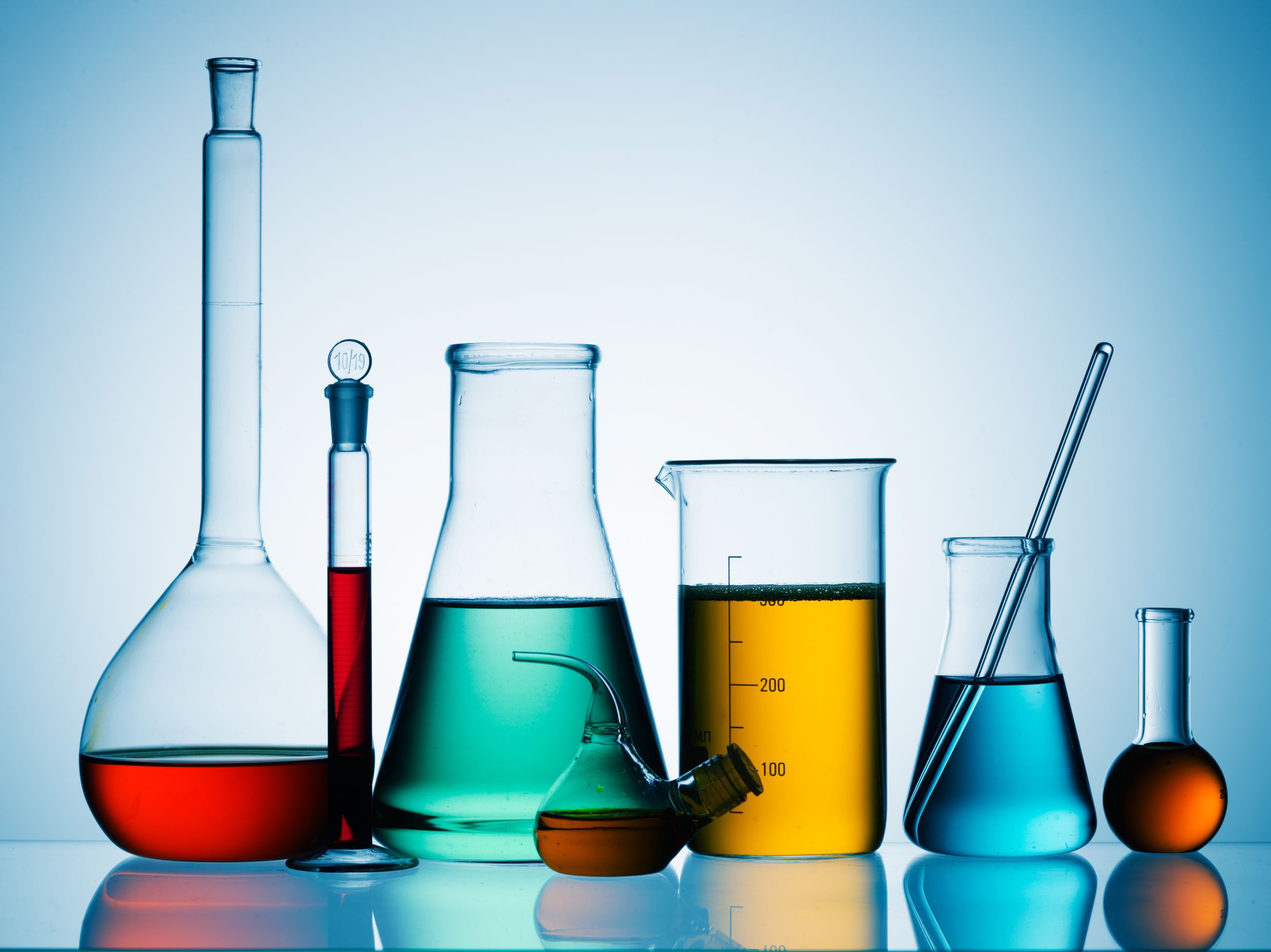 Assorted laboratory glassware equipment ready for an experiment in a science research lab