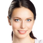 Portrait of happy smiling business woman, isolated over white background
