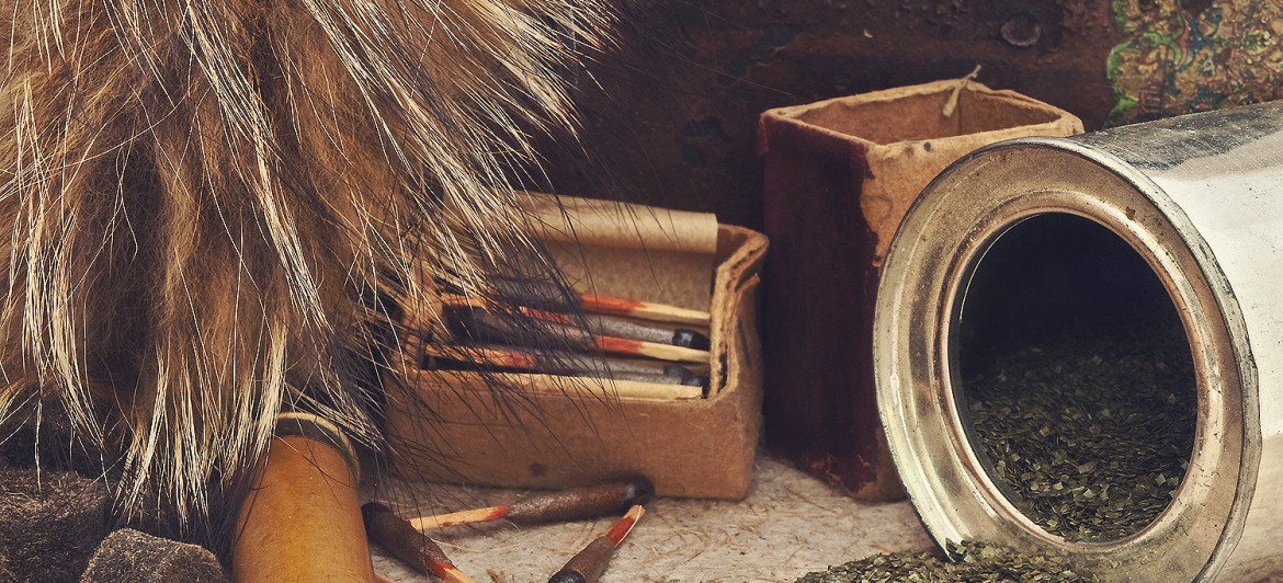 Photo of old matches for hunting with fox brush and gunpowder at beige