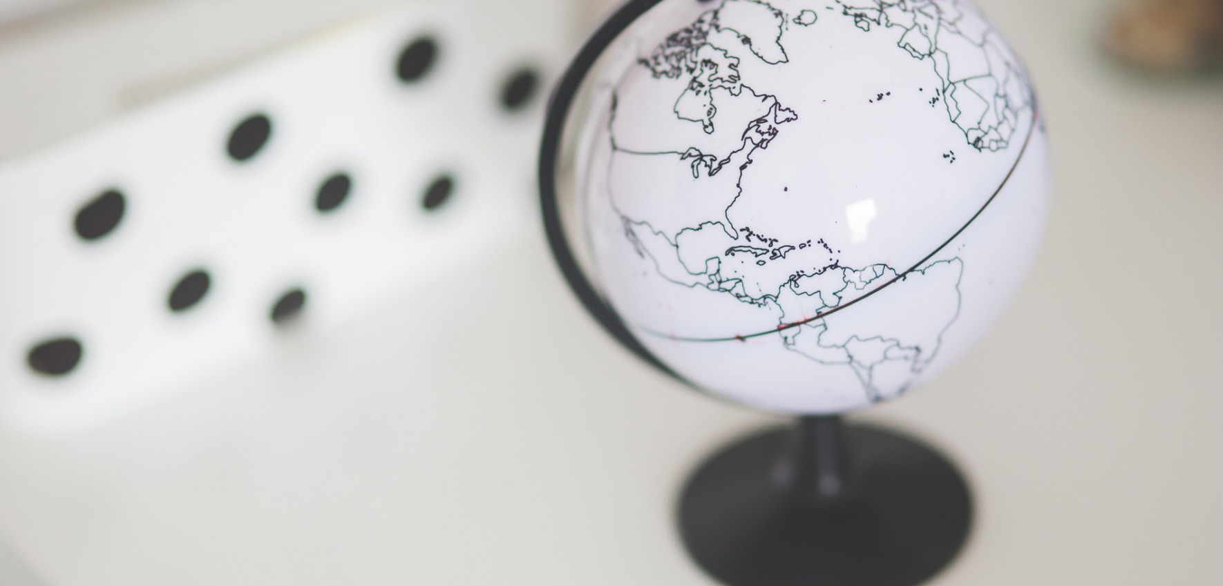 kaboompics.com_White-globe-on-a-desk