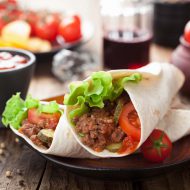 tortilla wraps with meat and vegetables