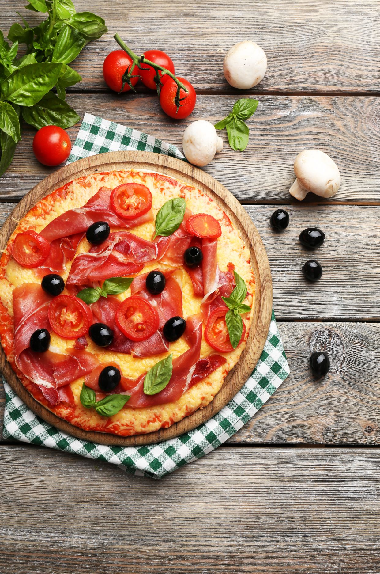 Delicious pizza served on wooden table