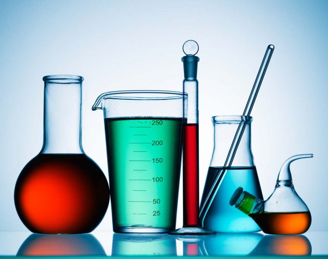 Assorted laboratory glassware equipment ready for an experiment in a science research lab