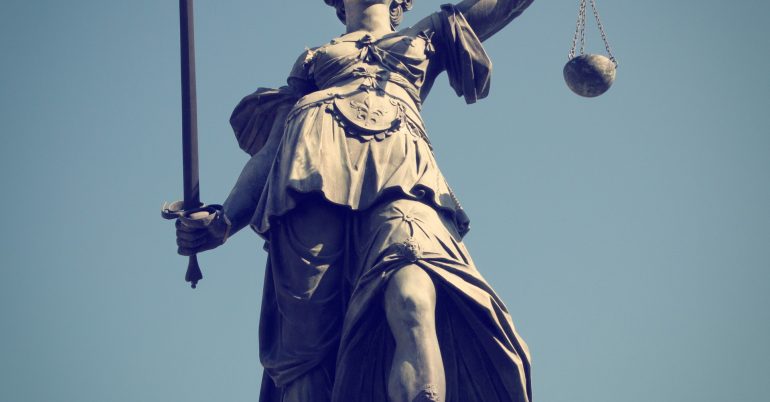 Statue of Lady Justice with retro effect.